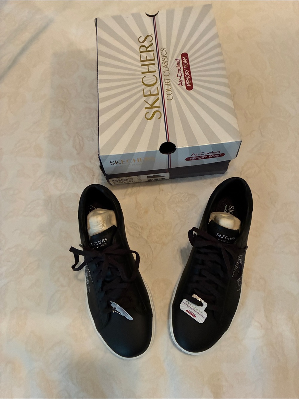 Skechers Women’s Black Low-Top Sneakers with White Soles
